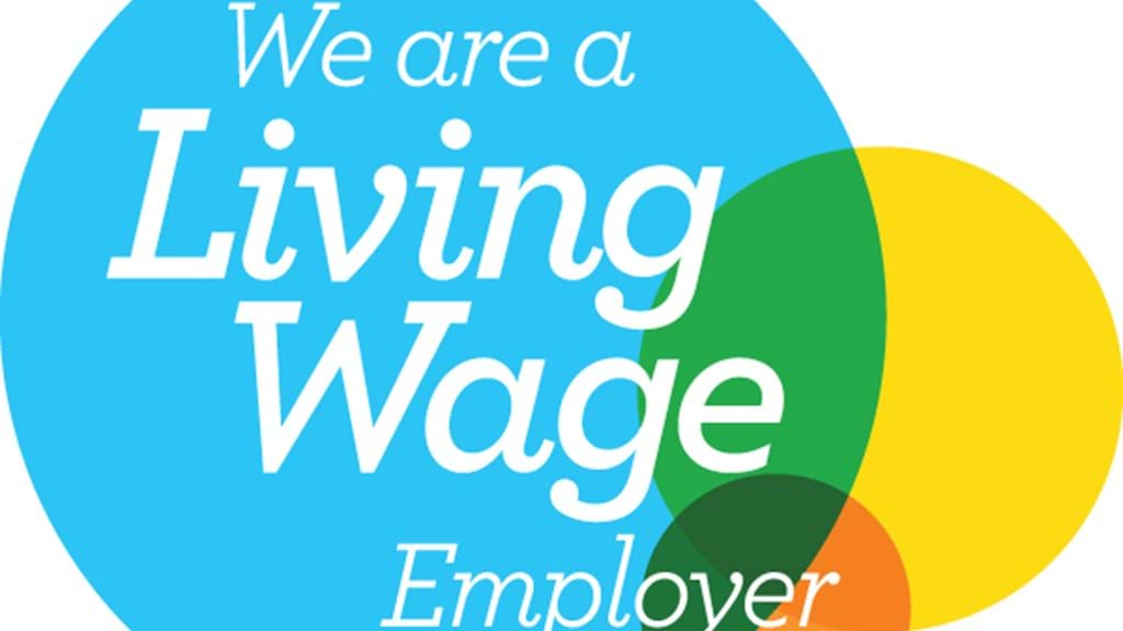 PIG'S EARS CELEBRATES LIVING WAGE COMMITMENT